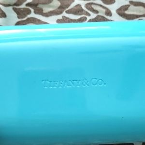 Tiffany and co sunglass case and cleaning clothing